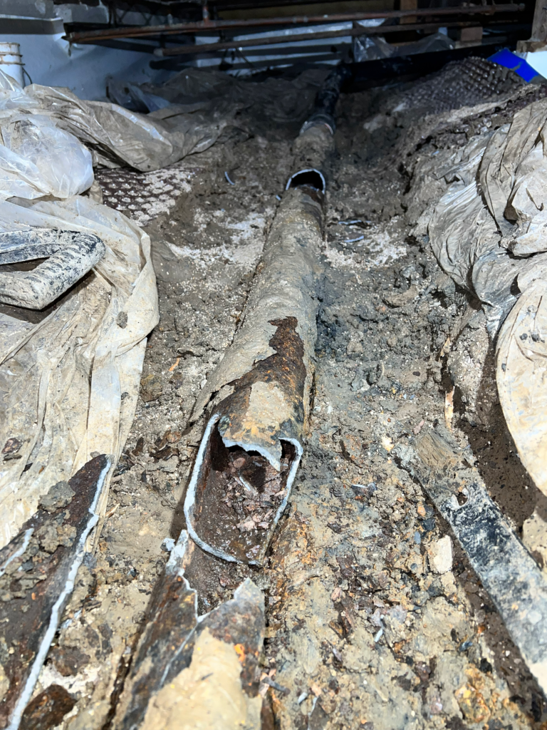 Broken Plumbing Drain Line leaking under house